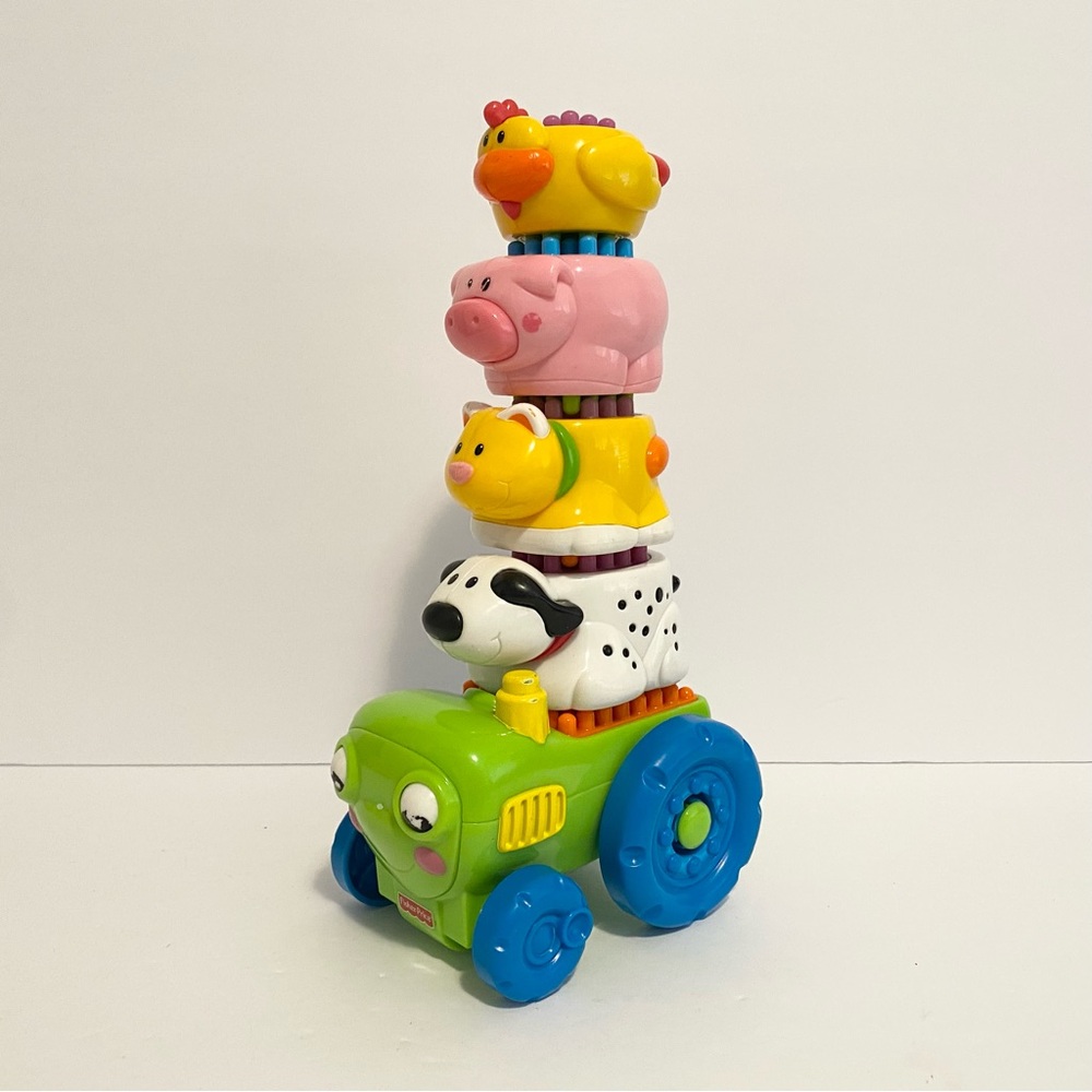 Fisher Price Brilliant Basics Shake + Stack Tractor Set Animals Bristle Blocks